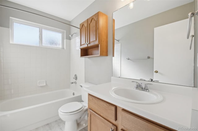 full bath featuring toilet, vanity, and bathtub / shower combination