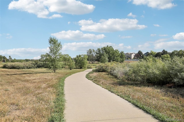 view of home's community with a lawn