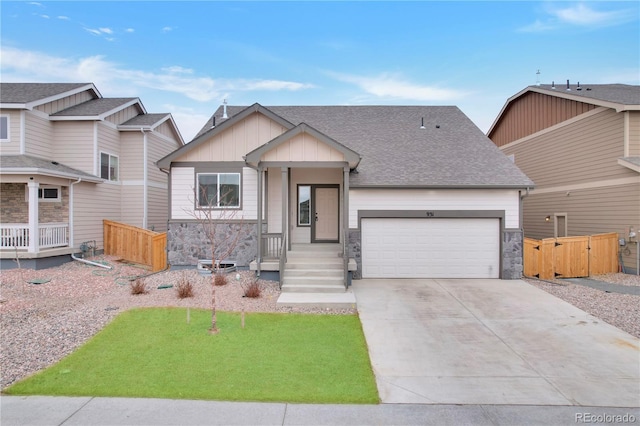 view of front facade with a garage and a front yard