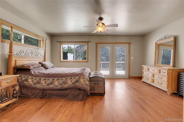 bedroom with access to exterior, ceiling fan, french doors, and light hardwood / wood-style flooring