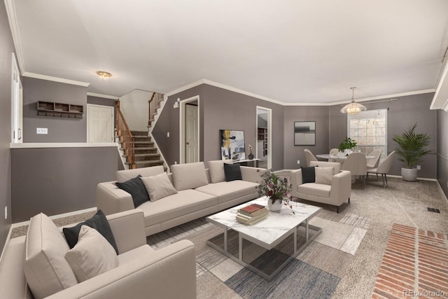 carpeted living area featuring visible vents, a notable chandelier, stairway, crown molding, and baseboards