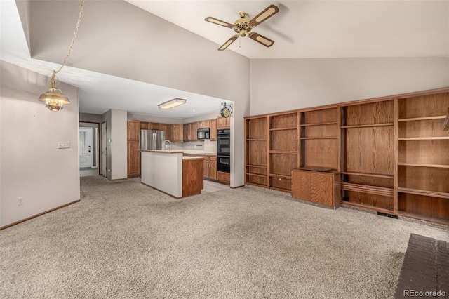 unfurnished living room featuring baseboards, high vaulted ceiling, ceiling fan, a sink, and light carpet