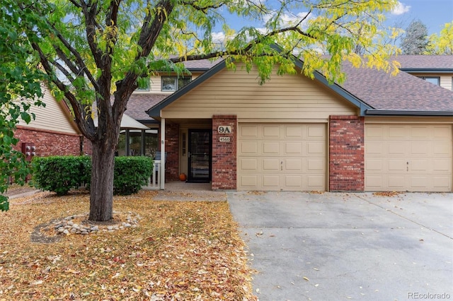 view of front of property featuring a garage