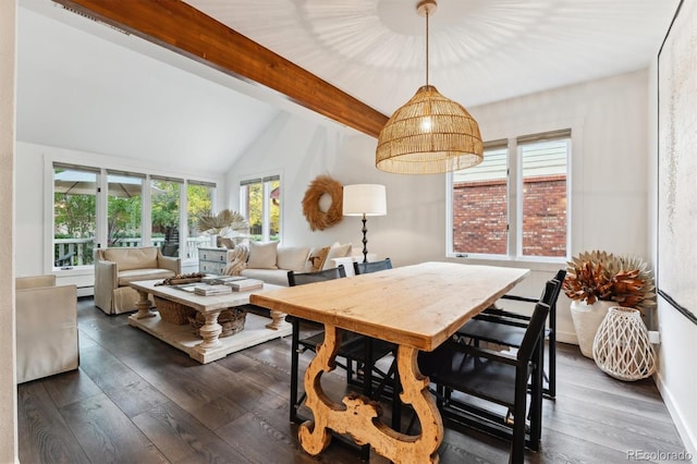 dining area featuring vaulted ceiling with beams and dark hardwood / wood-style floors