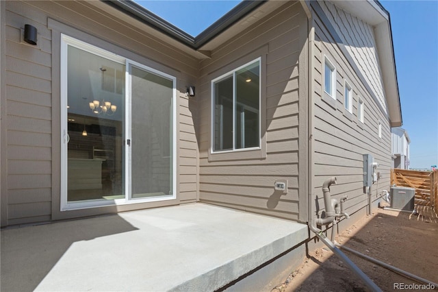 6129 Zebulon Pl, Timnath, CO 80547 - view of patio featuring central AC unit and fence