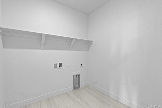 6129 Zebulon Pl, Timnath, CO 80547 - laundry room with washer hookup, baseboards, and electric dryer hookup