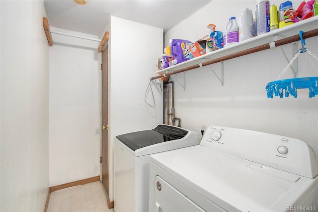 laundry room with washer and clothes dryer