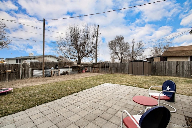 view of patio / terrace with a storage shed