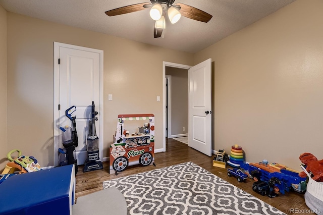 1100 E Harvey St, Castle Rock, CO 80108 - playroom featuring wood finished floors and ceiling fan