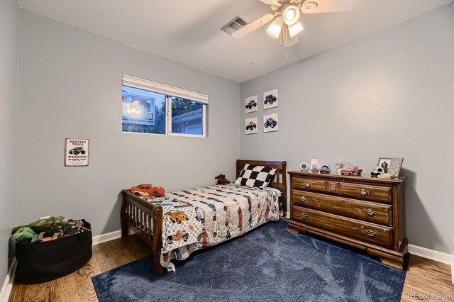 1100 E Harvey St, Castle Rock, CO 80108 - bedroom with wood finished floors and a ceiling fan