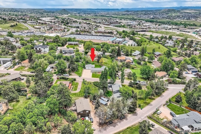 1100 E Harvey St, Castle Rock, CO 80108 - aerial view of property and surrounding area with nearby suburban area