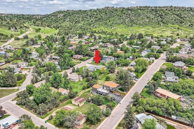 1100 E Harvey St, Castle Rock, CO 80108 - aerial overview of property's location featuring nearby suburban area