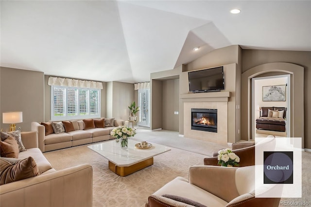13806 E Chenango Dr, Aurora, CO 80015 - carpeted living area featuring vaulted ceiling, a fireplace, and recessed lighting