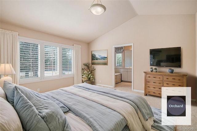 13806 E Chenango Dr, Aurora, CO 80015 - bedroom featuring vaulted ceiling, light colored carpet, and ensuite bathroom