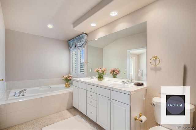 13806 E Chenango Dr, Aurora, CO 80015 - full bath featuring speckle patterned floor, double vanity, a garden tub, and recessed lighting