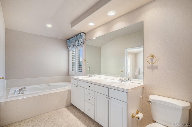 13806 E Chenango Dr, Aurora, CO 80015 - bathroom featuring double vanity, a garden tub, speckle patterned floor, and recessed lighting