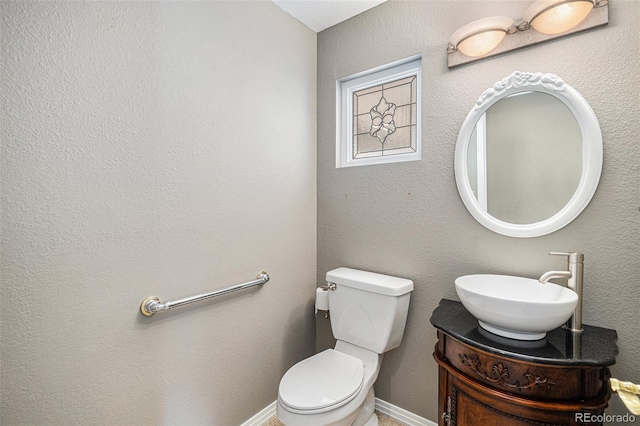 13806 E Chenango Dr, Aurora, CO 80015 - half bath with vanity and toilet
