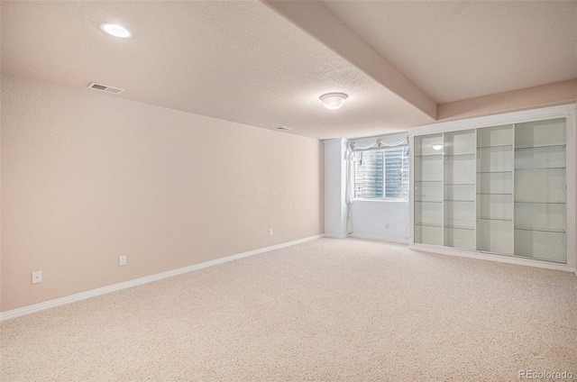 13806 E Chenango Dr, Aurora, CO 80015 - spare room with carpet, a textured ceiling, and recessed lighting