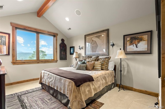 carpeted bedroom with lofted ceiling with beams