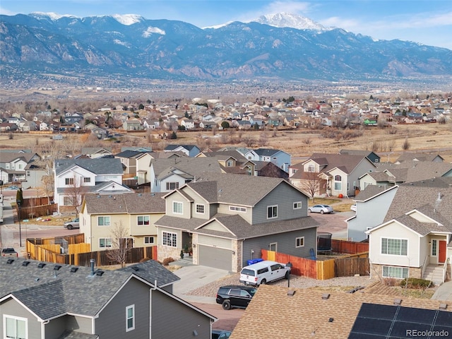 birds eye view of property featuring a mountain view