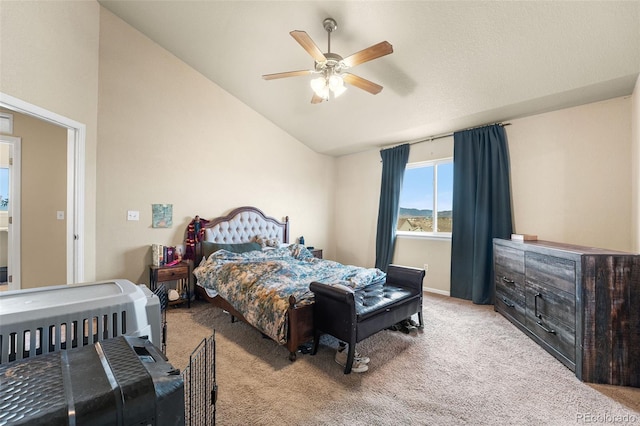 carpeted bedroom featuring ceiling fan and lofted ceiling