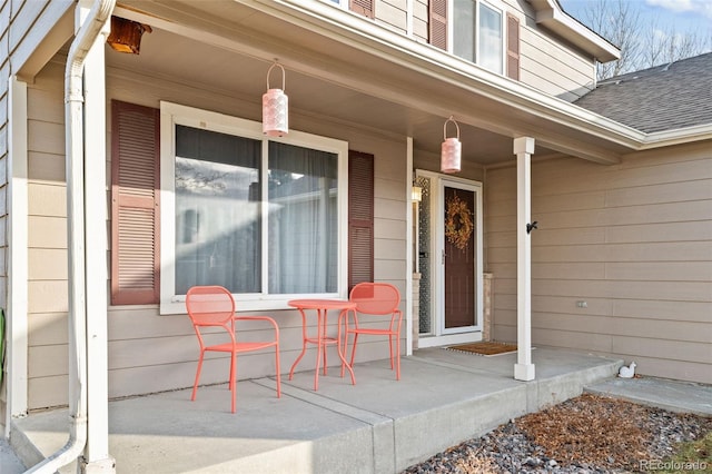 property entrance with covered porch