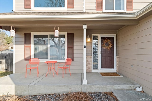 doorway to property with a porch