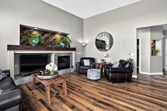 30889 Manitoba Dr, Evergreen, CO 80439 - living room featuring wood finished floors and a fireplace