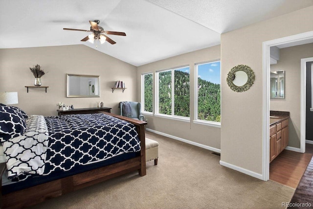 30889 Manitoba Dr, Evergreen, CO 80439 - carpeted bedroom featuring lofted ceiling and ceiling fan