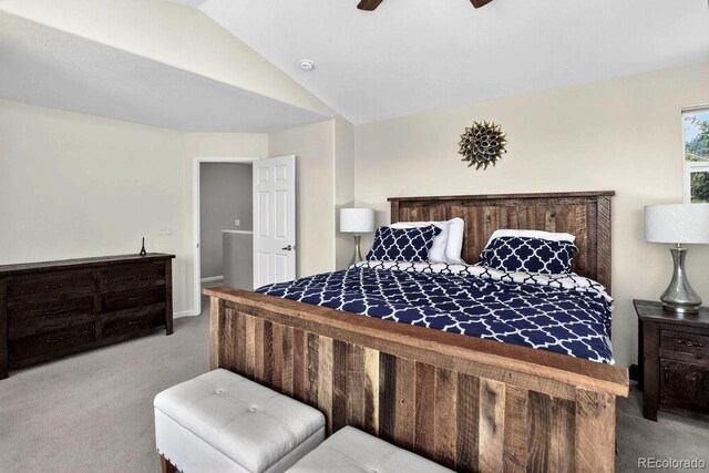 30889 Manitoba Dr, Evergreen, CO 80439 - carpeted bedroom with vaulted ceiling and ceiling fan