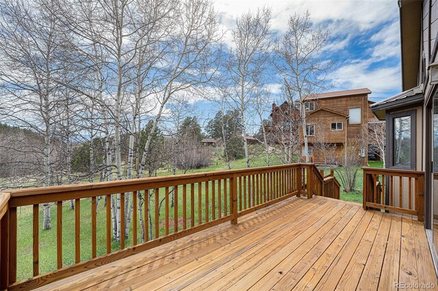 70 Silver Springs Rd, Bailey, CO 80421 - wooden terrace featuring a lawn