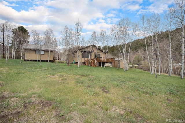 70 Silver Springs Rd, Bailey, CO 80421 - view of green lawn featuring a deck