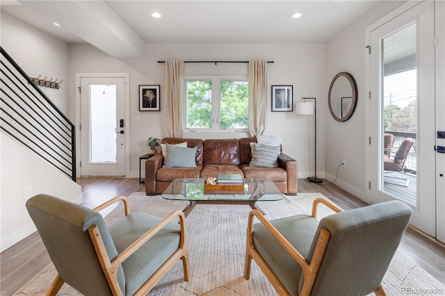 4184 Kalamath St, Denver, CO 80211 - living area with stairs, baseboards, light wood finished floors, and recessed lighting