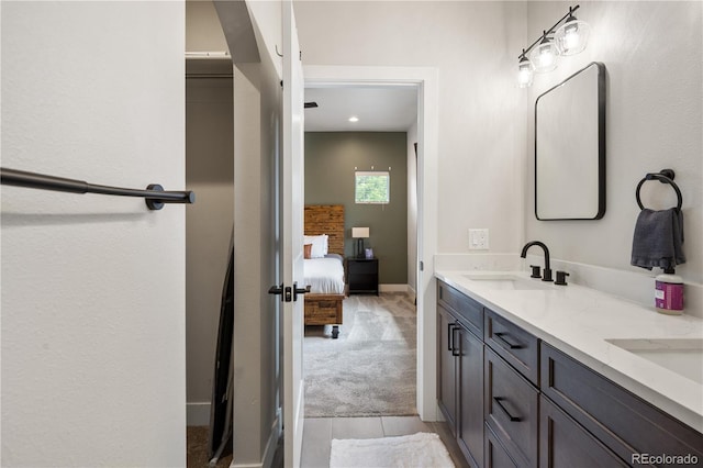 4184 Kalamath St, Denver, CO 80211 - ensuite bathroom with double vanity and tile patterned floors