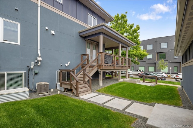 4184 Kalamath St, Denver, CO 80211 - exterior space with a yard, central AC, and a wooden deck