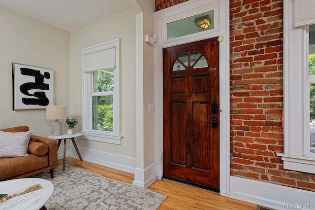 2527 W Dunkeld Pl, Denver, CO 80211 - foyer featuring light wood finished floors