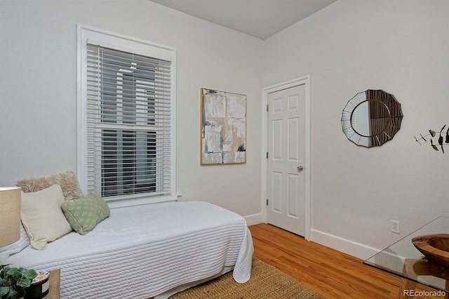 2527 W Dunkeld Pl, Denver, CO 80211 - bedroom with wood finished floors and baseboards