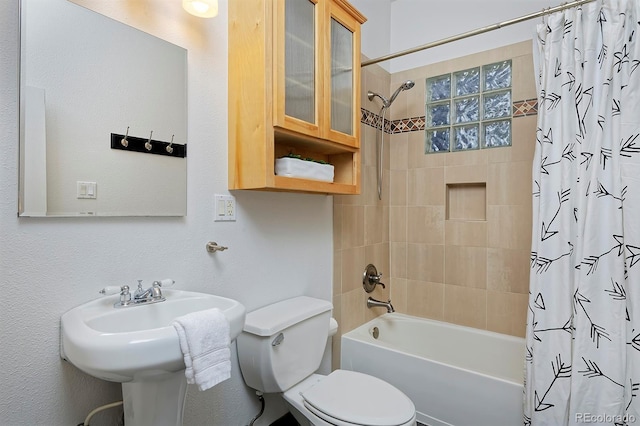2527 W Dunkeld Pl, Denver, CO 80211 - bathroom with shower / tub combo with curtain and toilet