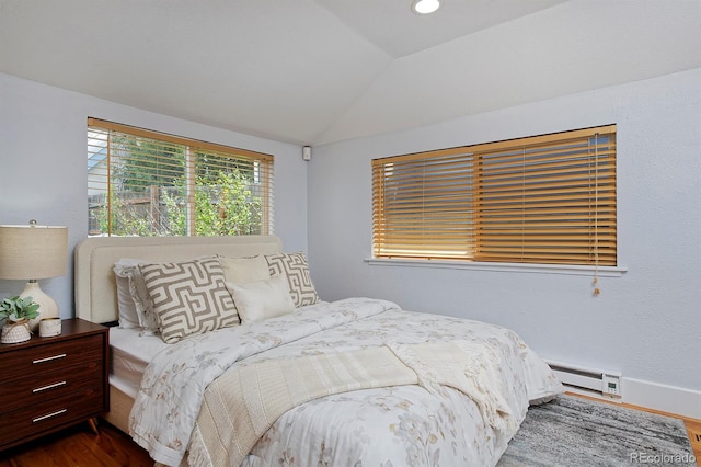 2527 W Dunkeld Pl, Denver, CO 80211 - bedroom with a baseboard radiator, dark wood finished floors, and lofted ceiling