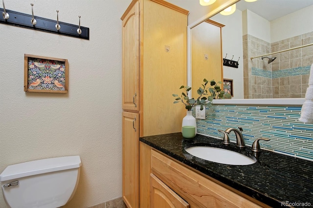 2527 W Dunkeld Pl, Denver, CO 80211 - bathroom with vanity and a tile shower