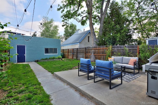 2527 W Dunkeld Pl, Denver, CO 80211 - fenced backyard featuring an outdoor hangout area and a patio area