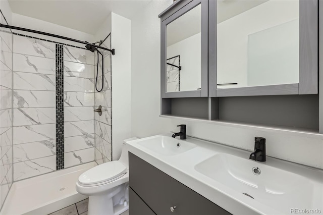 4940 E Donald Ave Unit 8, Denver, CO 80222 - full bathroom featuring double vanity and a tile shower