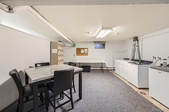 4940 E Donald Ave Unit 8, Denver, CO 80222 - dining room featuring separate washer and dryer