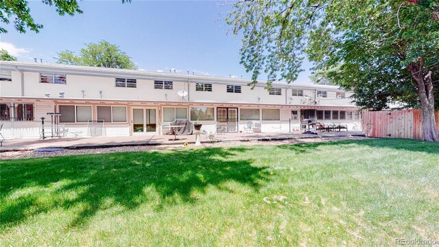 4940 E Donald Ave Unit 8, Denver, CO 80222 - rear view of property featuring a patio area