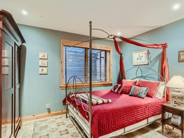 3135 11th St, Boulder, CO 80304 - bedroom featuring wood finished floors, recessed lighting, and baseboards