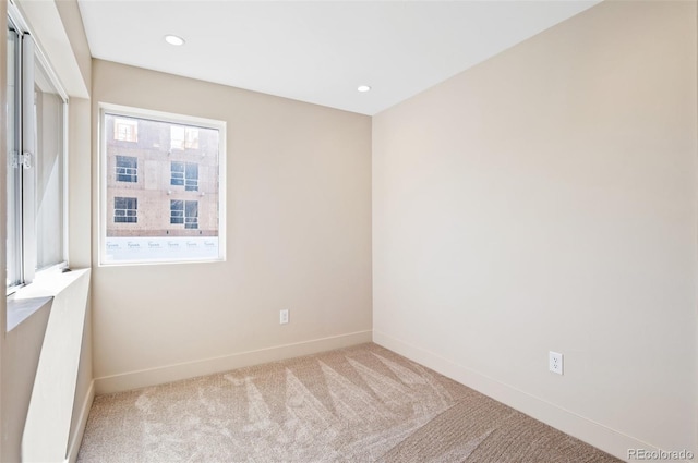 view of carpeted spare room