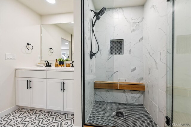 3533 Saguaro Cir, Colorado Springs, CO 80925 - bathroom with a marble finish shower, vanity, and recessed lighting