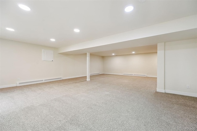 3533 Saguaro Cir, Colorado Springs, CO 80925 - finished below grade area featuring a baseboard heating unit, carpet, recessed lighting, and a baseboard radiator