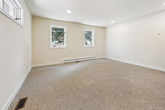 3533 Saguaro Cir, Colorado Springs, CO 80925 - unfurnished room with baseboard heating, light colored carpet, and recessed lighting