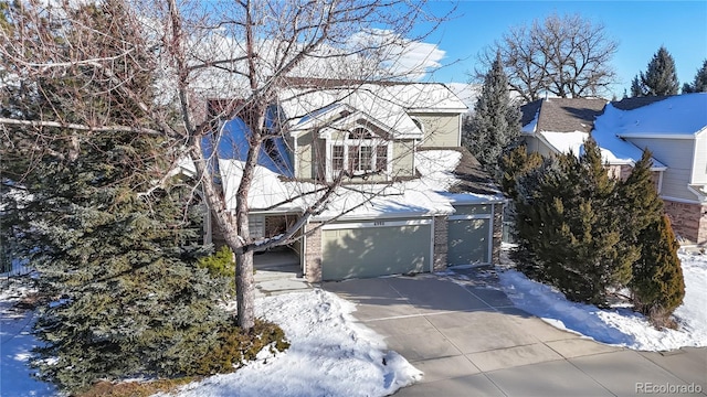 view of front of home with a garage